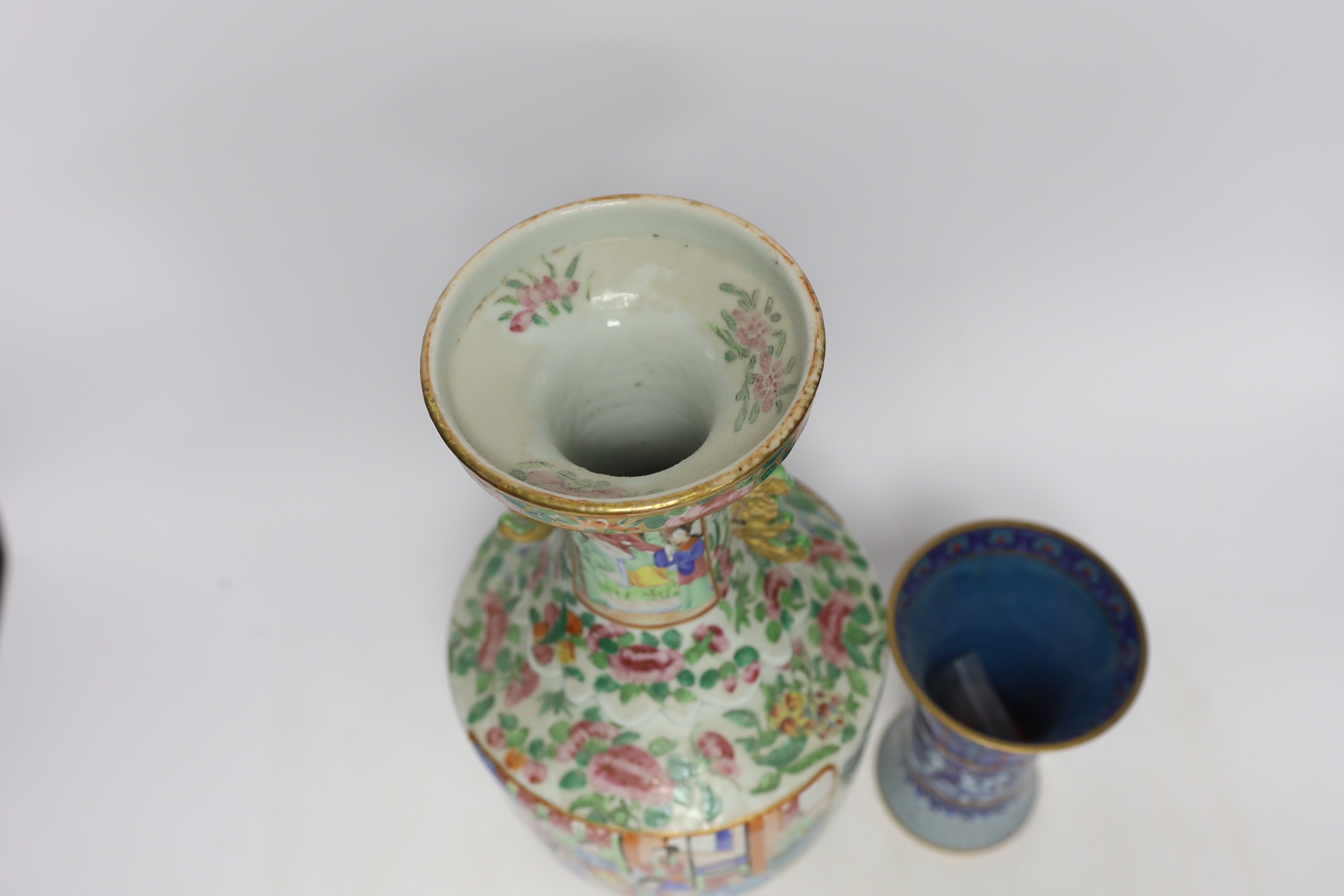 A 19th century Chinese famille rose two handled vase and a cloisonné gu beaker style vase, largest 33cm high